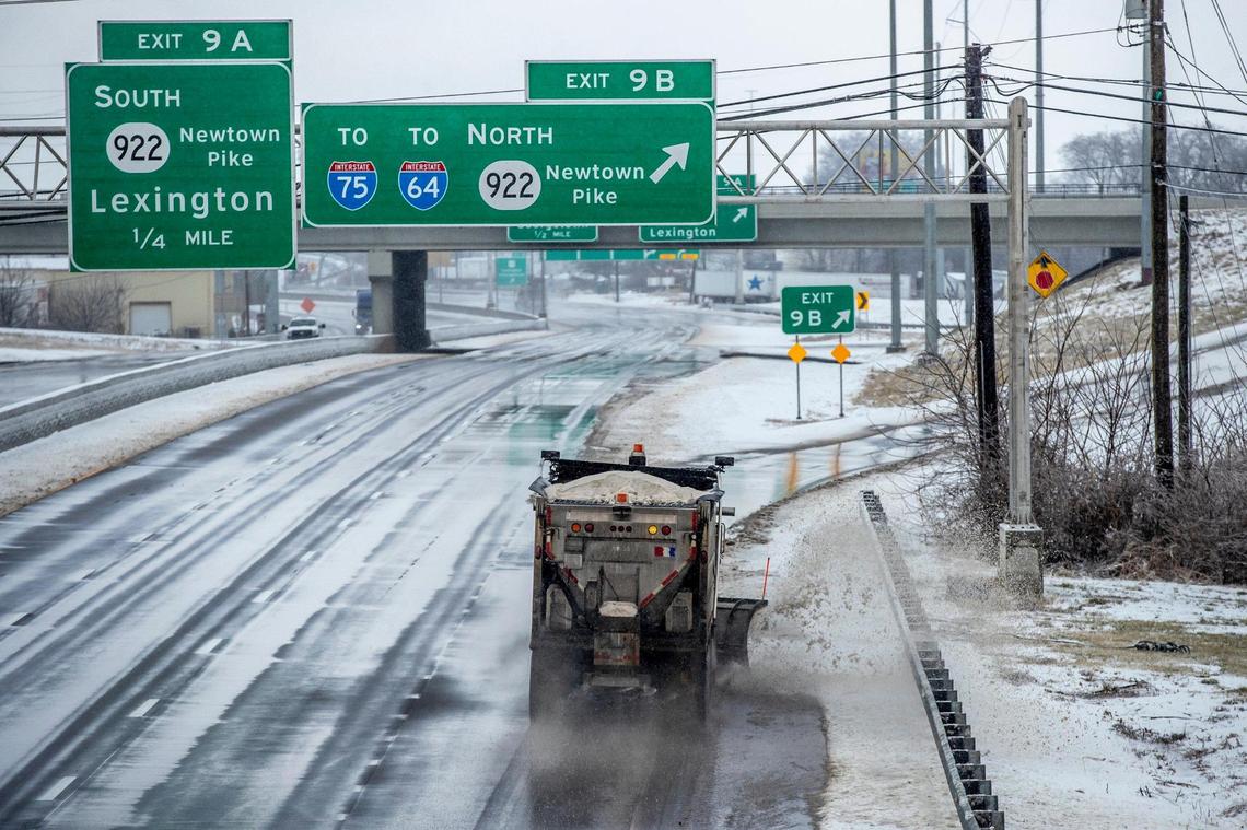 A plow clears snow from New Circle Road near Newtown Pike in Lexington, Ky., on Friday, Feb. 4, 2022.