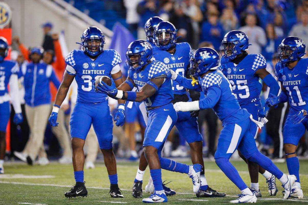 Kentucky Wildcats linebacker DeAndre Square (5) celebrates an interception against the Mississippi State Bulldogs in the fourth quarter during the game at Kroger Field in Lexington, Ky., Saturday, October 15, 2022.