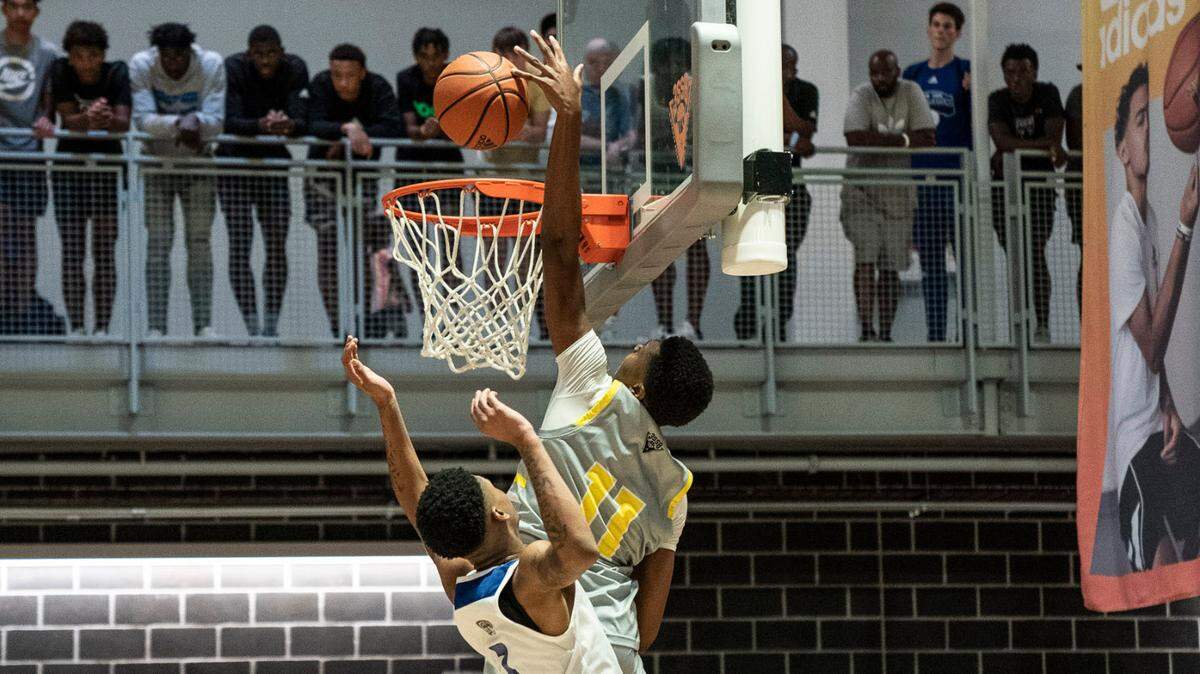 Tyler Smith (11) goes above the rim to make a play on the Adidas 3SSB circuit in Hoover, Ala., the first stop on the shoe company tour in the July 2021 evaluation period.