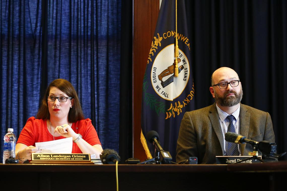 Kentucky Secretary of State Alison Lundergan Grimes and executive director of the State Board of Elections Jared Dearing during a special meeting of the State Board of Elections Tuesday at the Kentucky State Capitol in Frankfort.