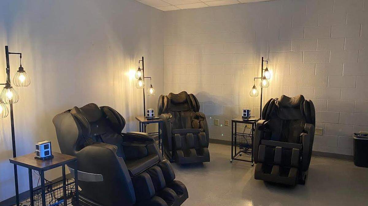 The new teacher workroom at Warren Central High School has massage chairs, charging stations for electronics, new lighting, new mailboxes, a coffee bar and classroom supplies, an effort by Principal Joey Norman “to take care” of his weary staff. Source: Warren County Schools