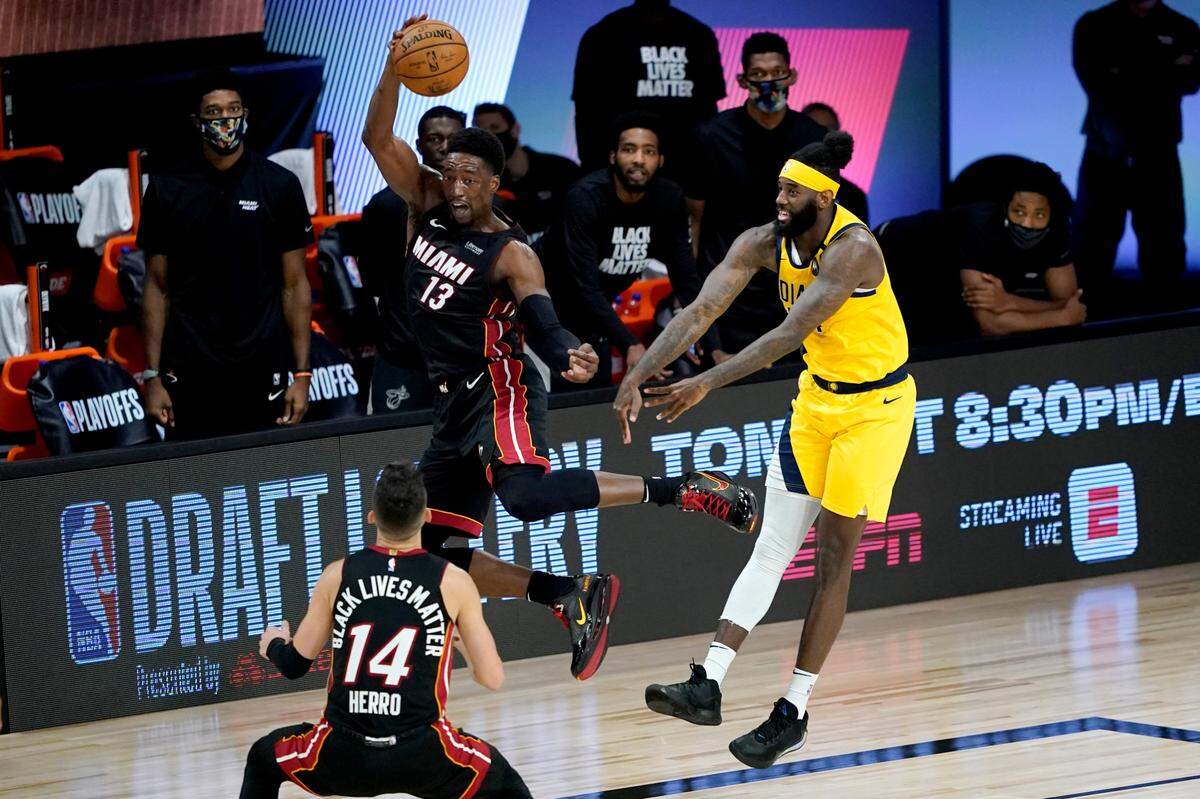 Bam Adebayo (13) saved the ball from going out of bounds during the Heat’s Game 2 win against the Pacers on Thursday. The former UK star averaged 15.0 points, 11.3 rebounds and 5.3 assists in Miami’s four-game sweep.