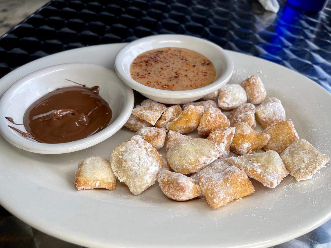 Rosemont Station’s Beignets served with Nutella and Spicy Honey dipping sauces.