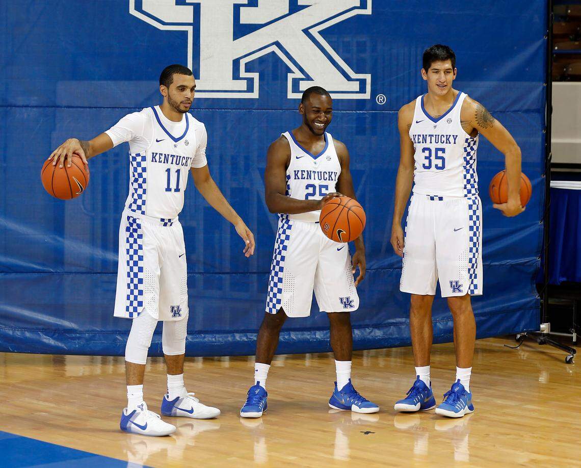 Full checkers strip: Kentucky seniors Mychal Mulder (11), Dominique Hawkins (25) and Derek Willis (35) posed during the University of Kentucky's men's basketball photo day on Sept. 15, 2016.