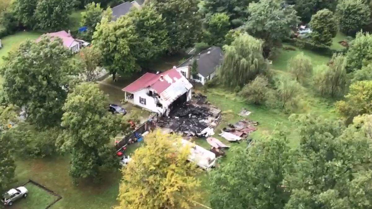 Three people were found dead inside this home on Mitchellsburg Knob Road in Boyle County early Saturday.
