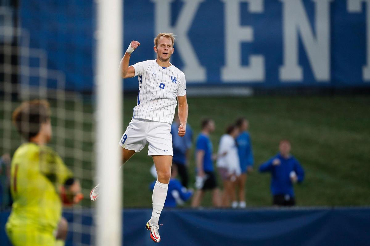 Kentucky forward Eythor Bjorgolfsson (9) celebrates after scoring against Louisville during the first half on Tuesday night. The Wildcats rallied from a 1-0 deficit to win.