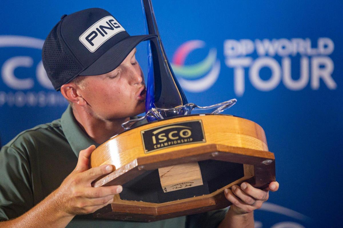 William Mouw kisses the championship trophy after winning the ISCO Championship on Sunday, July 13, 2025, at Hurstbourne Country Club in Louisville, Ky.