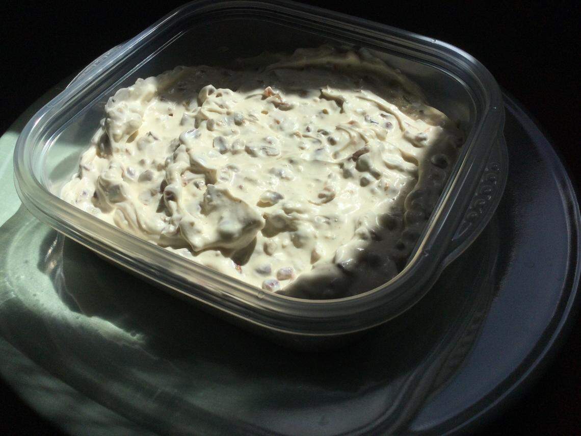 Mix chopped green olives and pecans into cream cheese and mayonnaise with a little of the brine from the olives and some seasoned salt for the version of olive nut from Lexington’s Saratoga Restaurant.