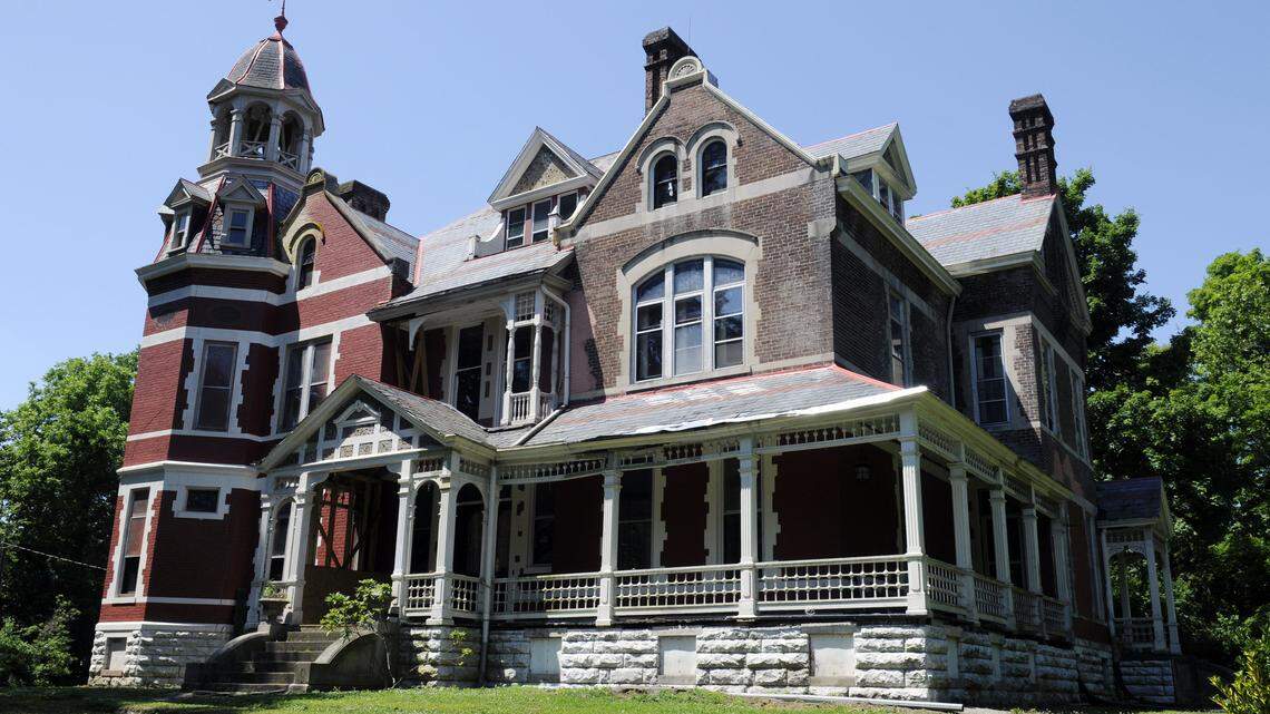 The Queen Anne mansion, on Lawrenceburg's Main Street, is 11,000 square feet and sits on several acres.  