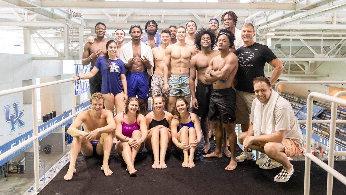 Members of the Kentucky men’s basketball and UK swimming and diving teams, as well as campus swimming instructors, posed for a group photo on “graduation day” for the basketball players.