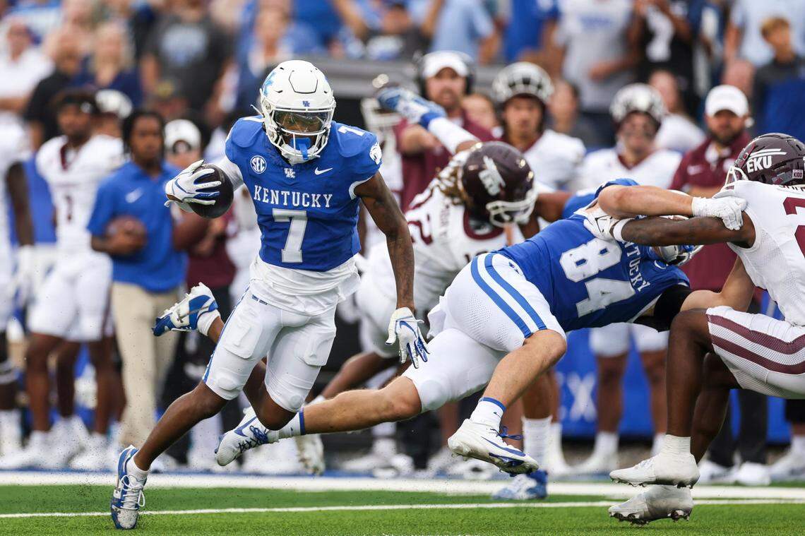 Kentucky wide receiver Barion Brown (7) runs the ball against the Eastern Kentucky during Saturday’s game at Kroger Field.