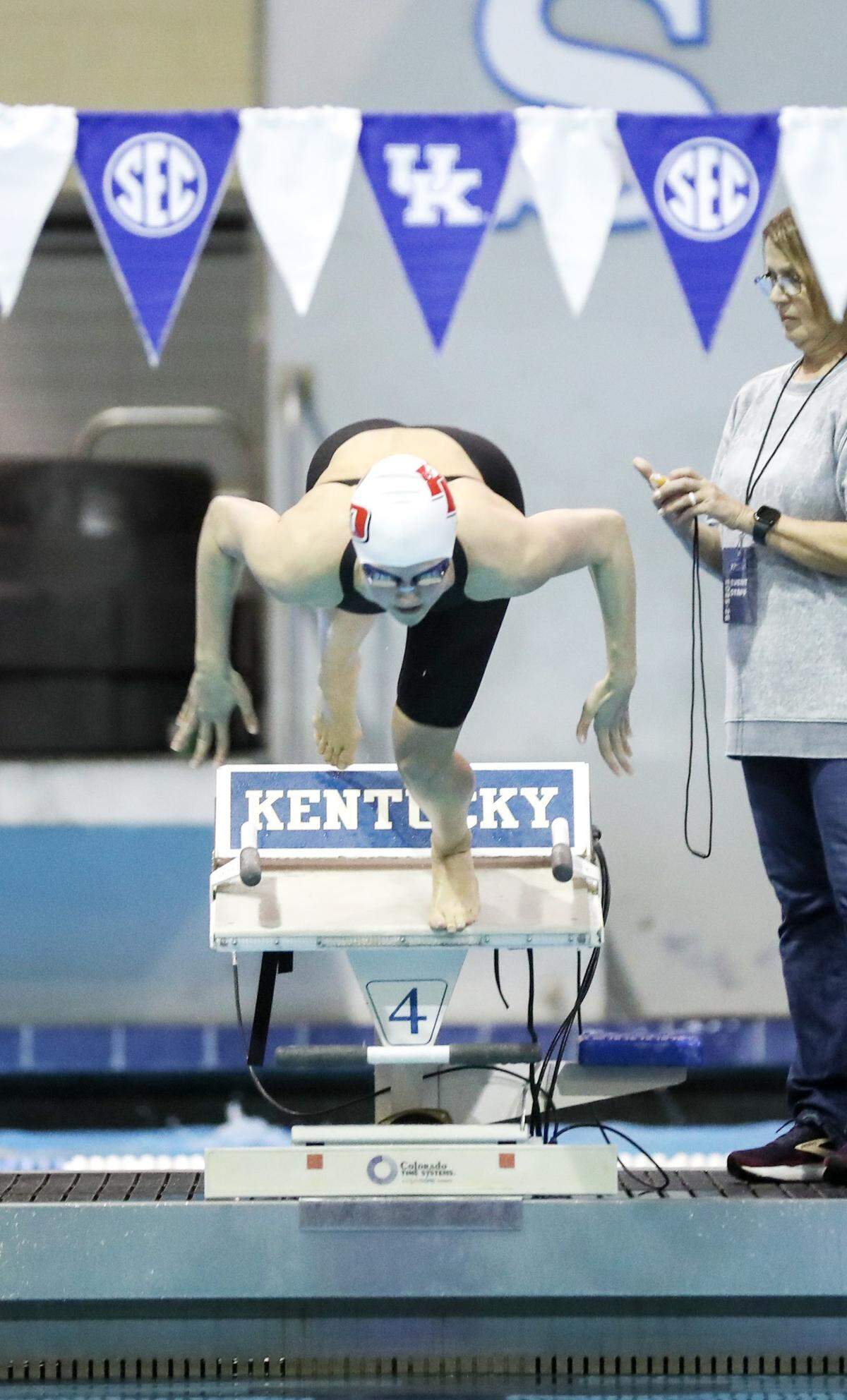 Dunbar freshman Kennedy Brooks started off the block in the 50 Freestyle of the Girls KHSAA State Swim Championship at UK's Lancaster Aquatic Center in Lexington, KY on Feb. 21, 2026. Brooks won the event with a time of 23.37. Photo by Pablo Alcala 
