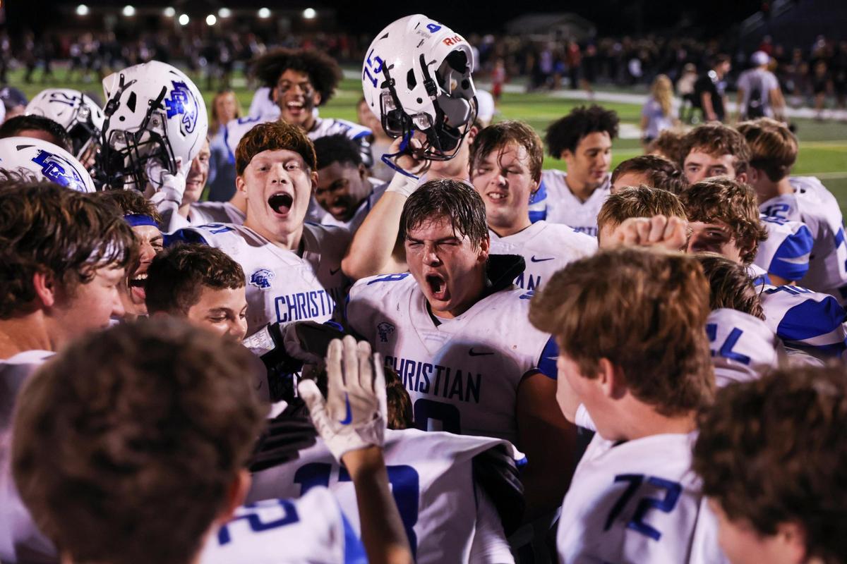 Lexington Christian’s Major Brown (center) led the Eagles’ post-game celebration after LCA defeated CAL 14-12 at Christian Academy-Louisville in Louisville on Friday.
