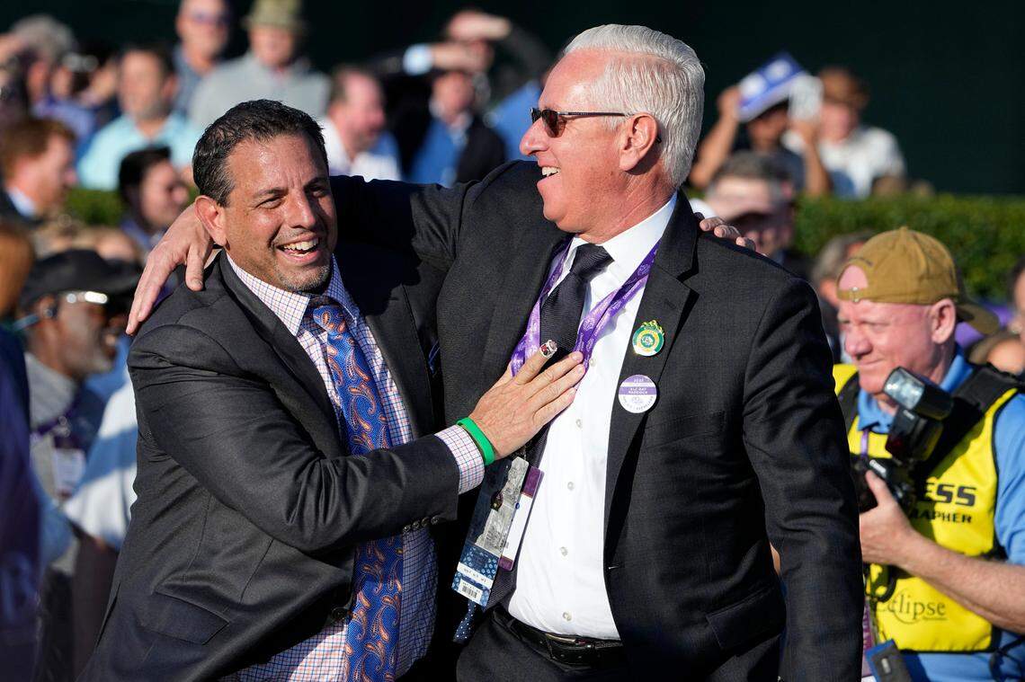 Owner Mike Repole, left, congratulates trainer Todd Pletcher after Forte’s victory in the Breeders’ Cup Juvenile at Keenelend Race Course on Nov. 4, 2022.