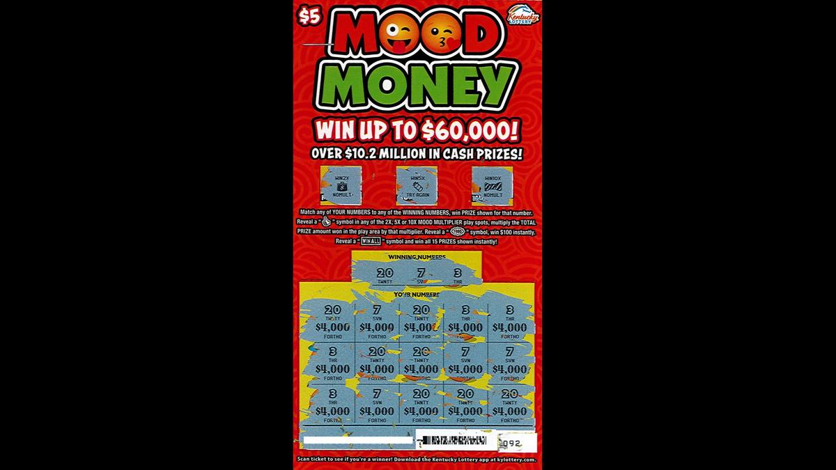 Richie's winning ticket, worth $60,000. The ticket was for the Kentucky Lottery's $5 Mood Money scratch-off game.