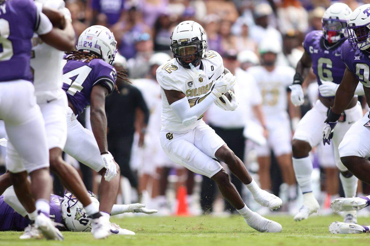 Colorado’s Travis Hunter (12) starred on offense as a wide receiver and on defense as a cornerback in the Buffaloes’ season-opening win at TCU.