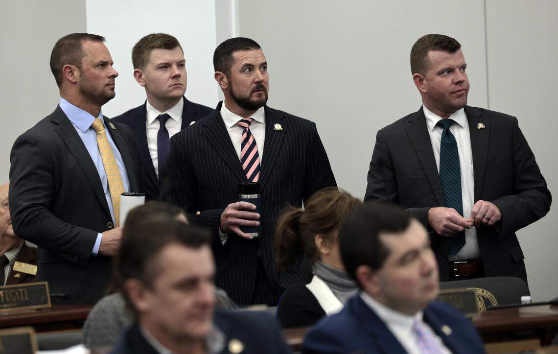 FRANKFORT, Feb. 27 – (Left to right) Rep. Josh Branscum, R-Russell Springs; Rep. Peyton Griffee, R-Mount Washington; House Speaker Pro Tempore David Meade, R-Stanford; and Rep. Derek Lewis, R-London, watch the vote count on an amendment to House Bill 2, an act related to Medicaid, during Friday’s House proceedings.