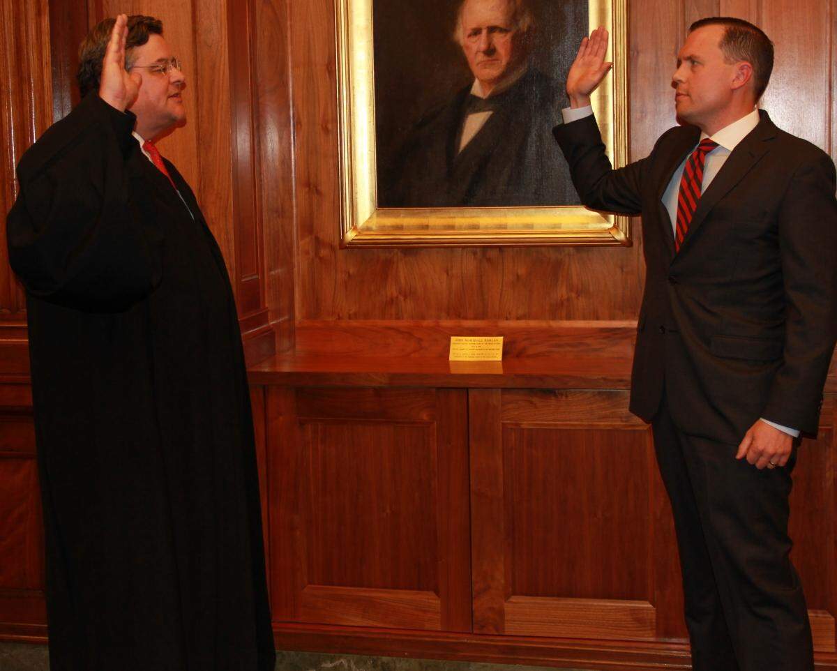 U.S. District Judge David J. Hale swore in Russell Coleman as the U.S. attorney in Louisville on Sept. 22, 2017.