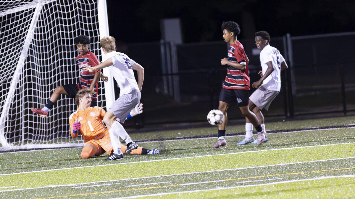 Dunbar boys soccer grabs key win over Lafayette that marks 100th for coach
