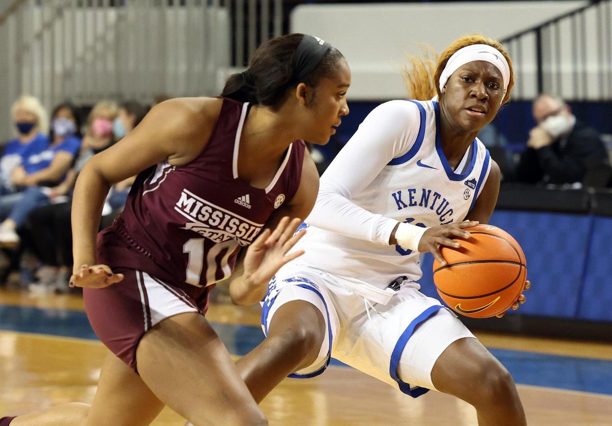 Kentucky’s Rhyne Howard looks for an opening against Mississippi State’s Aislynn Hayes during their game at Memorial Coliseum on Feb. 15.