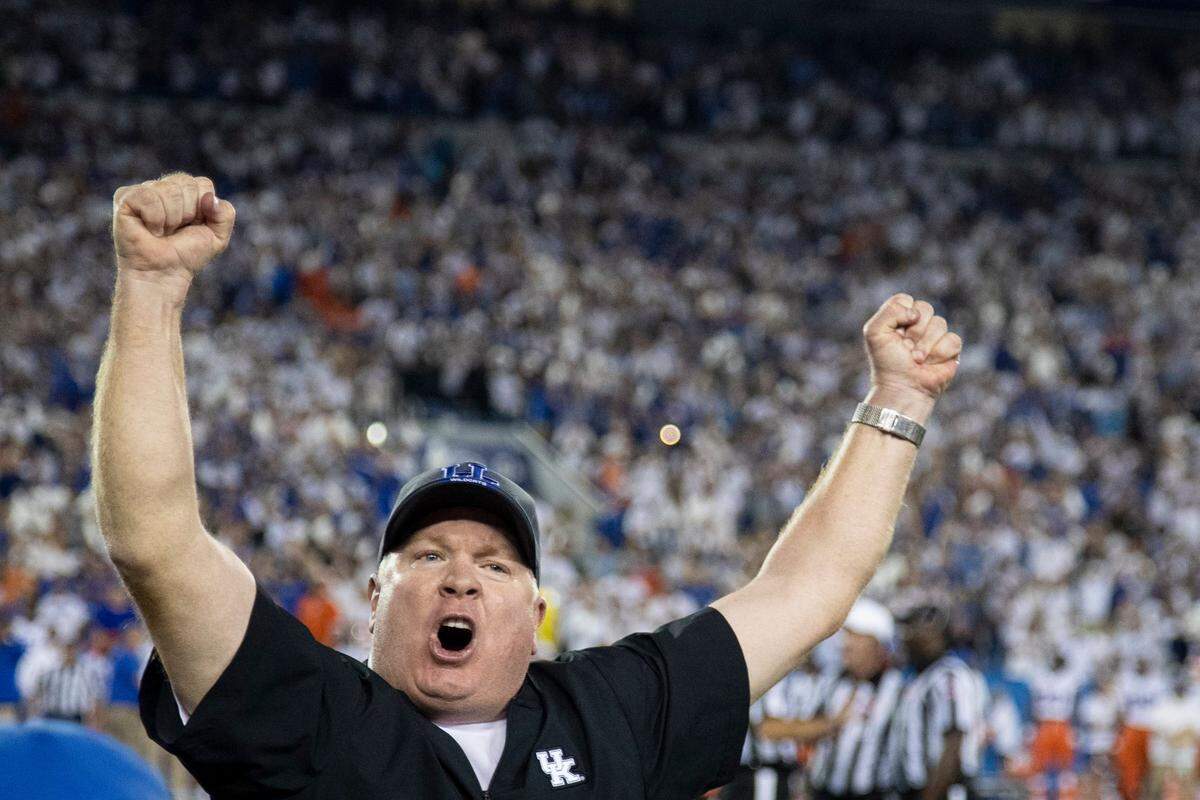 Kentucky head coach Mark Stoops celebrated after the Wildcats defeated Florida at Kroger Field this fall. UK is headed to a bowl game for a sixth straight season and will learn its destination Sunday.