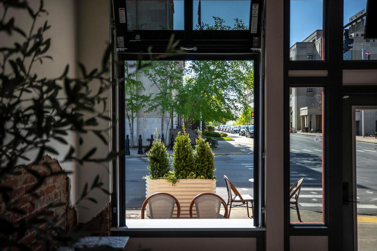 The atmosphere at Georgie’s Social House is casual, with mini garage door windows that they can raise in warm weather, with tables on the sidewalk as well.