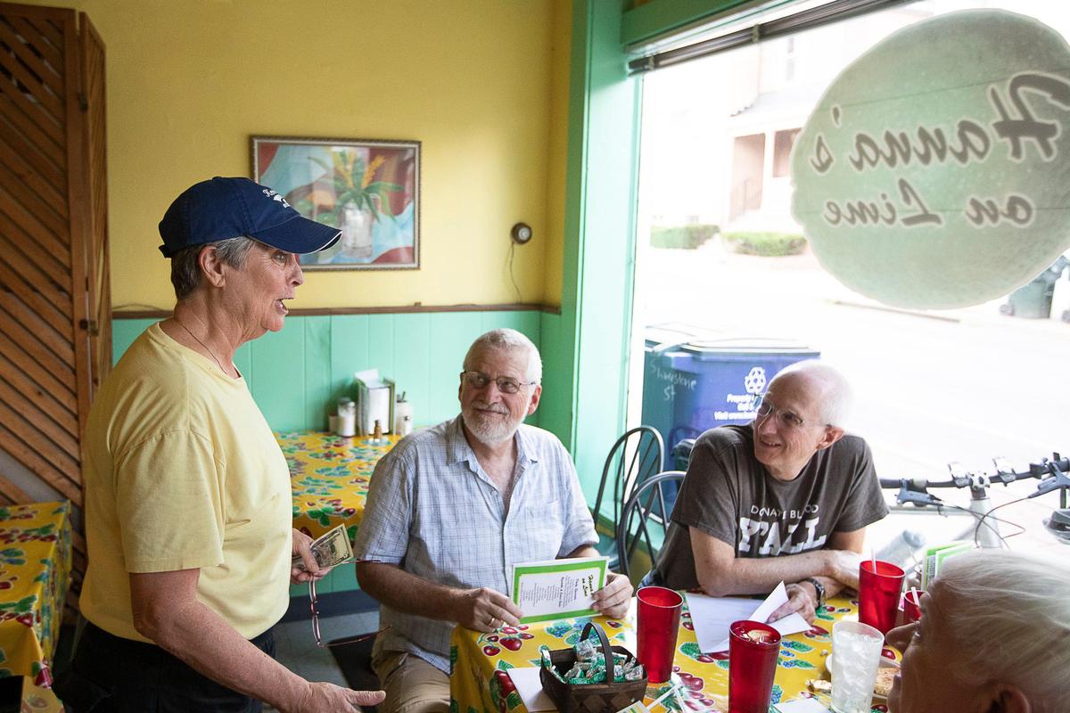 Hanna’s on Lime owner Beth Hanna talks to customers, including Dave Elbon, center, and Allan Hetzel. Over the years, many have made Hanna’s a regular stop for breakfast or lunch.