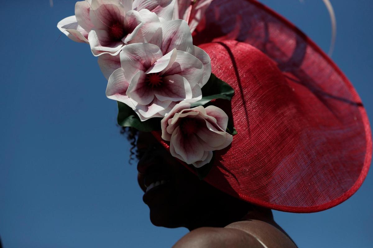 DeAnna Martin purchased her fascinator at Dee’s in Louisville, but then put the hat together herself for the Kentucky Derby at Churchill Downs in Louisville, Ky., Saturday, May 1, 2021.