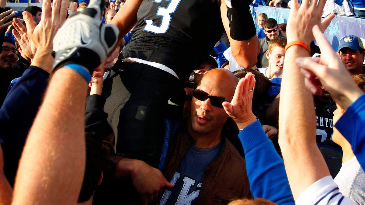 Kentucky Wildcats quarterback  Matt Roark (3) got a lift off the field after  Kentucky defeated Tennessee 10-7  on Saturday October 26, 2011  in Lexington, Ky.  Photo by Mark Cornelison | Staff