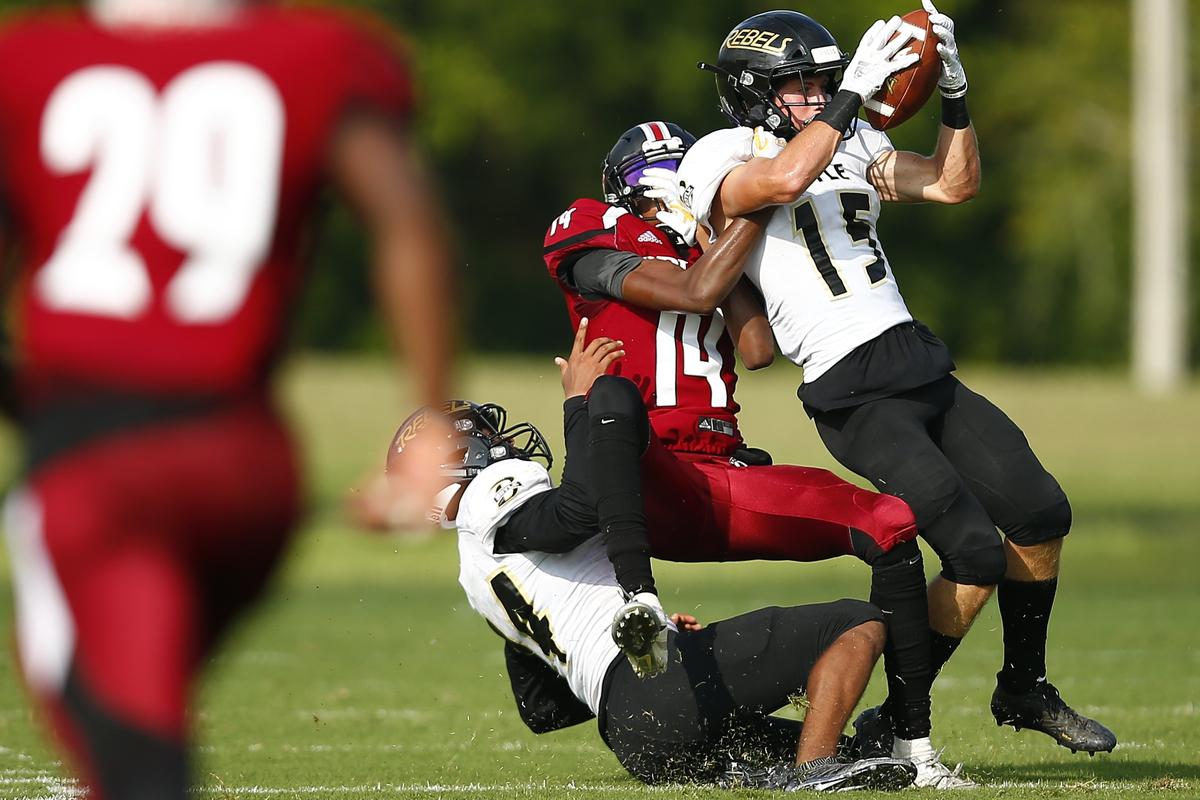 Boyle County’s Reese Smith (15) intercepted the ball intended for Ballard’s Rashad Bishop (14) during the Little Caesars Ft. Harrod Bowl Saturday at Alvis Johnson Field in Harrodsburg. Boyle County beat Ballard 35-21.