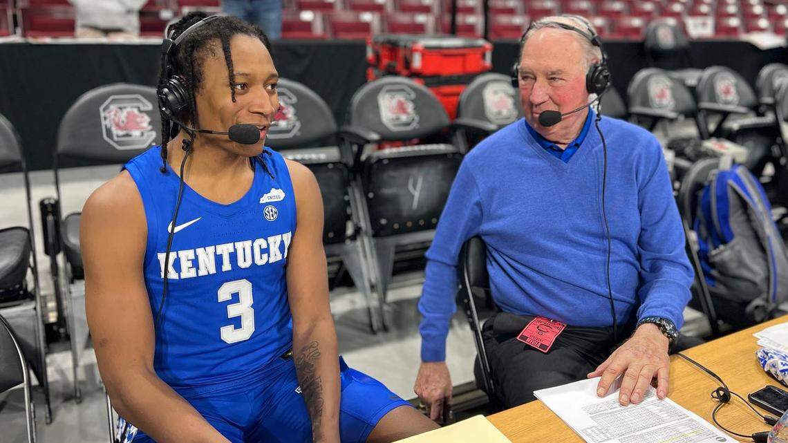 Kentucky’s TyTy Washington speaks with Mike Pratt after the team’s game against South Carolina on Feb. 8, 2022, in Columbia, S.C.