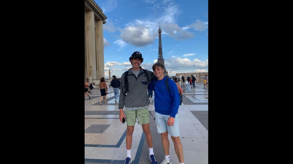 Ben Swayze, left, and Leopold Lecoq, at the Eiffel Tower in Paris, France.