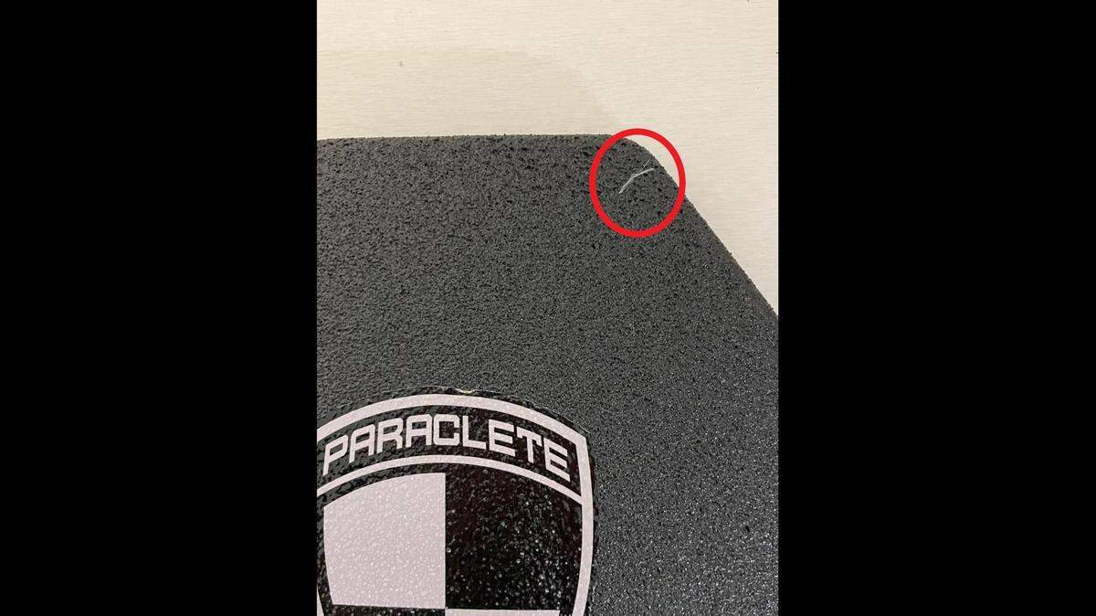 This photo shows the mark left by a knife on an officer’s “trauma plate” when a suspect allegedly tried to stab the cop on Thursday, March 4, 2021, according to Georgetown police.