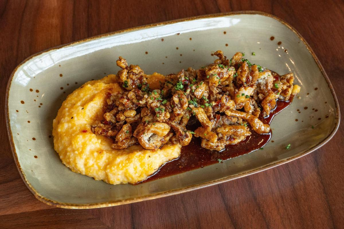 Local Crispy Mushrooms entree ($23) at Crafted at Boone Tavern, the restaurant at the Historic Boone Tavern Hotel in Berea, Ky. The vegetarian and gluten-free dish features local fried mushrooms, Weisenberger grits with a sweet soy mae ploy sauce.
