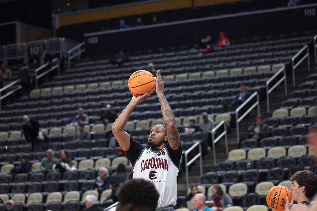 South Carolina fifth-year guard Ta’Lon Cooper takes a jump shot during a pre-NCAA Tournament open practice at PPG Paints Arena in Pittsburgh on Wednesday. Cooper began his college basketball career at Morehead State.