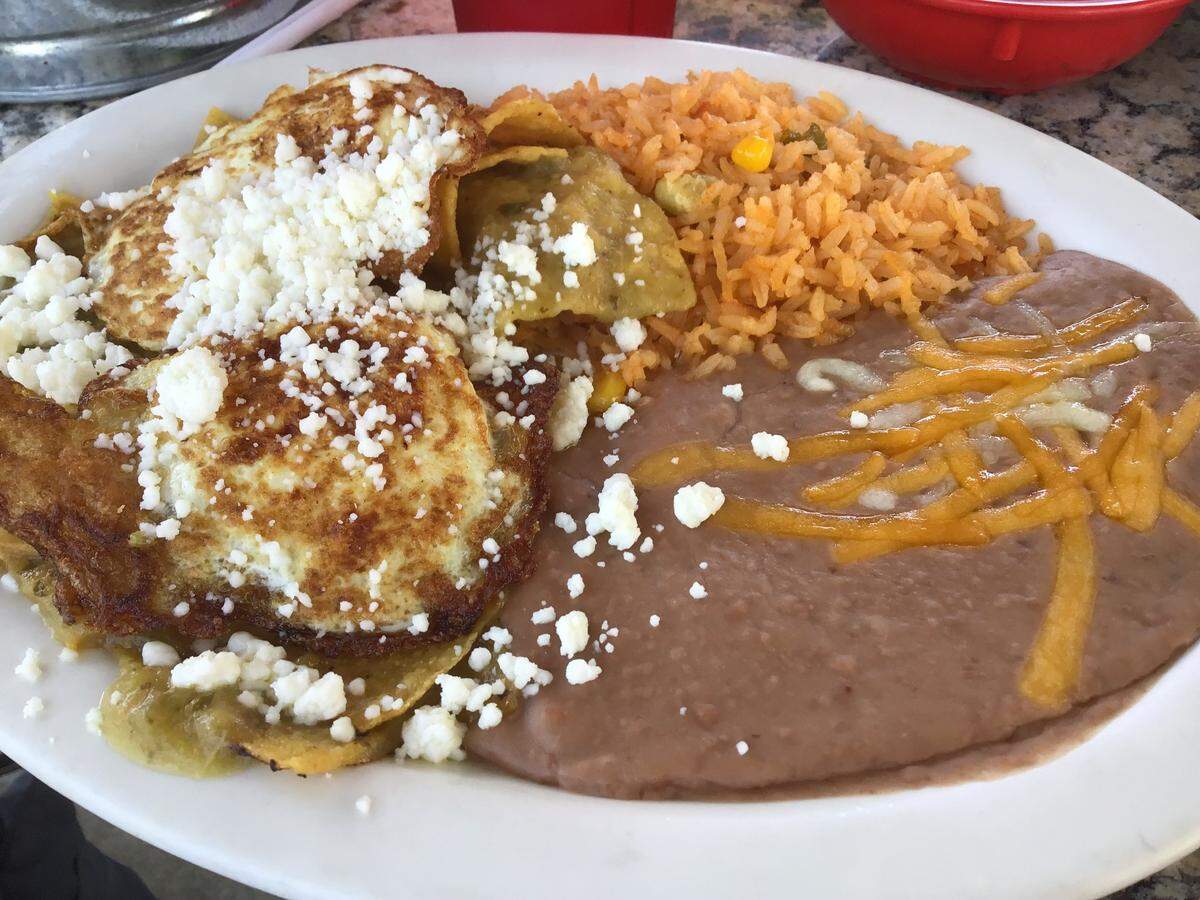 Mexico Mi Amor offers Chilaquiles Verdes, tortilla chips with verde sauce, queso fresco, sour cream and a fried egg. You can also add chicken.