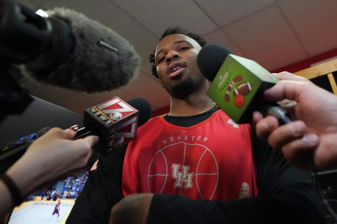 Houston guard L.J. Cryer (4) is interviewed at the Alamodome in San Antonio on April 3.