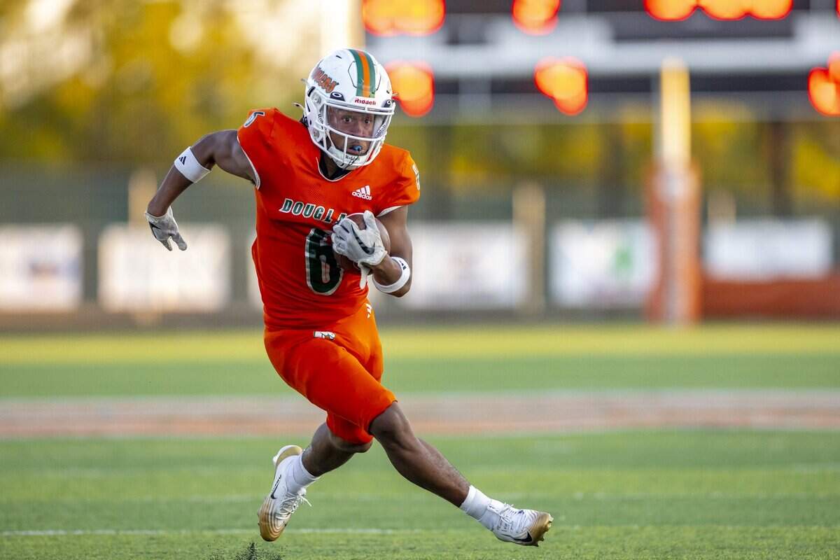 Frederick Douglass' Dakari Talbert (6) runs the ball during a game against Tates Creek in Lexington, Ky., on Friday, Sept. 12, 2025.