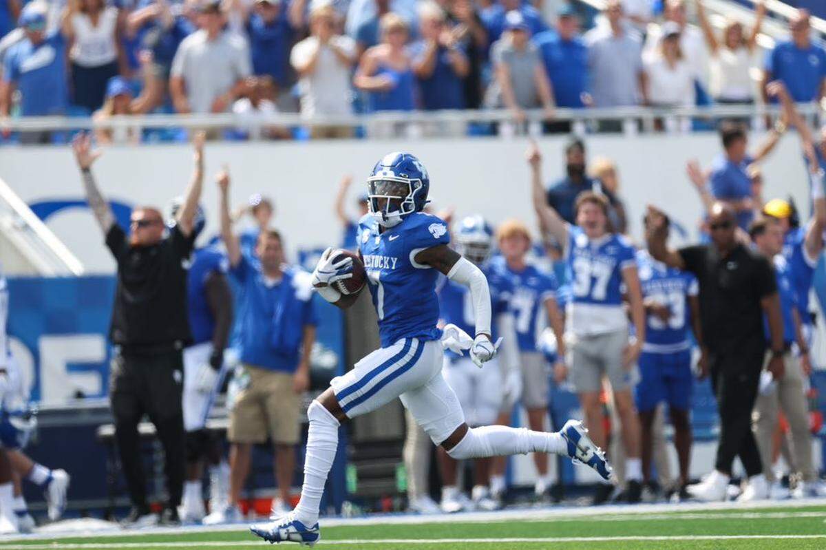 Kentucky’s Barion Brown returns a kickoff 99 yards for a touchdown against Ball State on Saturday.