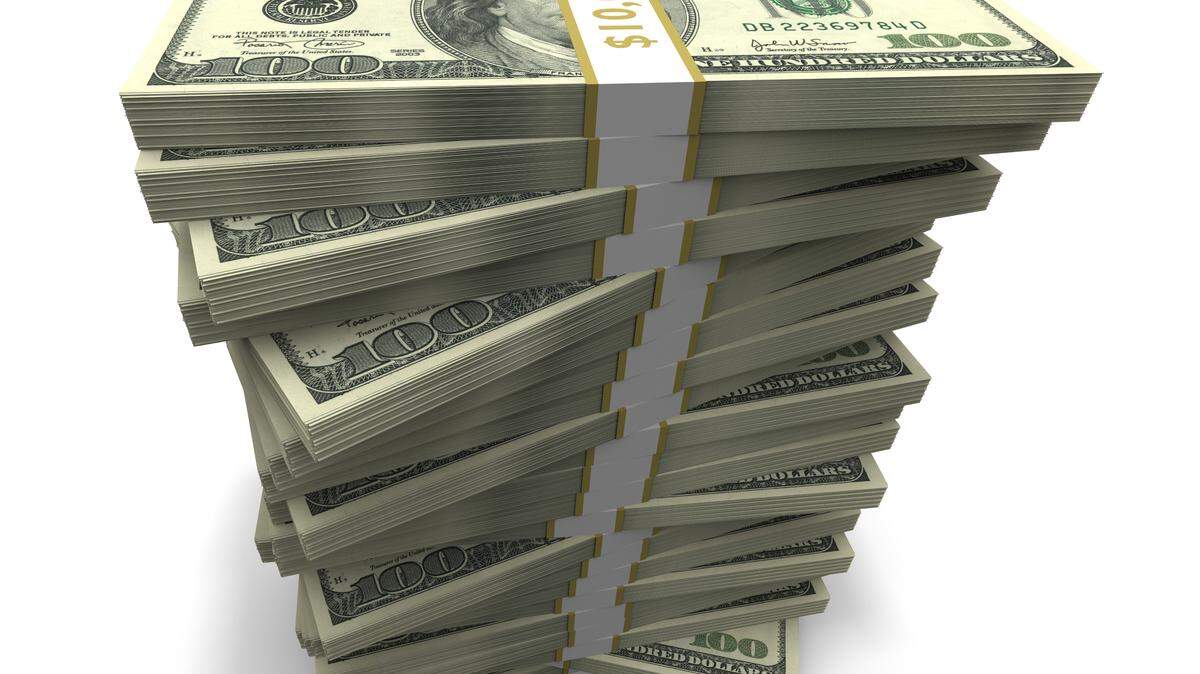 Stacks of $10,000. Over $100,000 total.