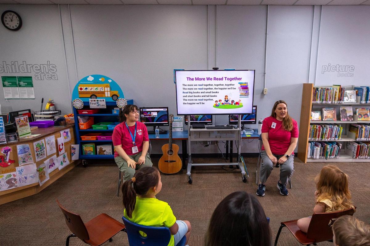 Children attend story time at the Lexington Public Library’s Village Branch temporary location off Alexandria Drive in Lexington, Ky.