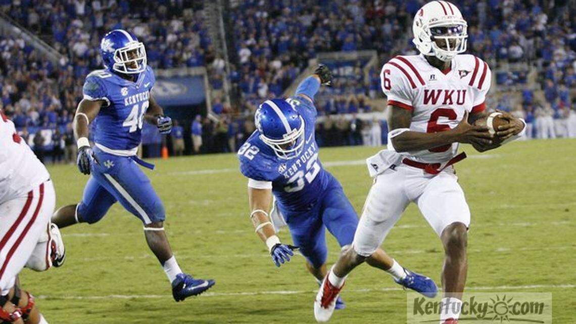 Western Kentucky Hilltoppers quarterback Kawaun Jakes (6) scores in overtime to win the game at Commonwealth Stadium Sept. 15, 2012 in Lexington, Ky. Photo by Amy Wallot