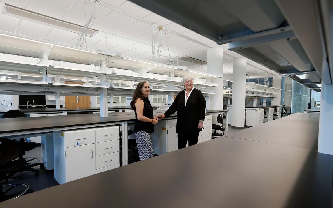 Kathleen O’Connor, professor of molecular and cellular biochemistry in the College of Medicine, and associate director of cancer education and mentoring at Markey Cancer Center, left, and Lisa Cassis, vice president for research and a researcher focusing on obesity and cardiovascular diseases, right, in one of the labs in the University of Kentucky’s new $265 million, 300,000-square-foot research building at the corner of Virginia Avenue and South Limestone.