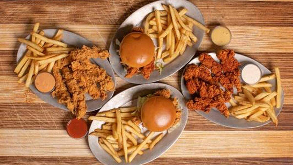 Tender Shack offers chicken tenders and sandwiches in two spice levels, Dang Good Seasoned and Nashville Hot AF (As Fire) but they are only available online through DoorDash.