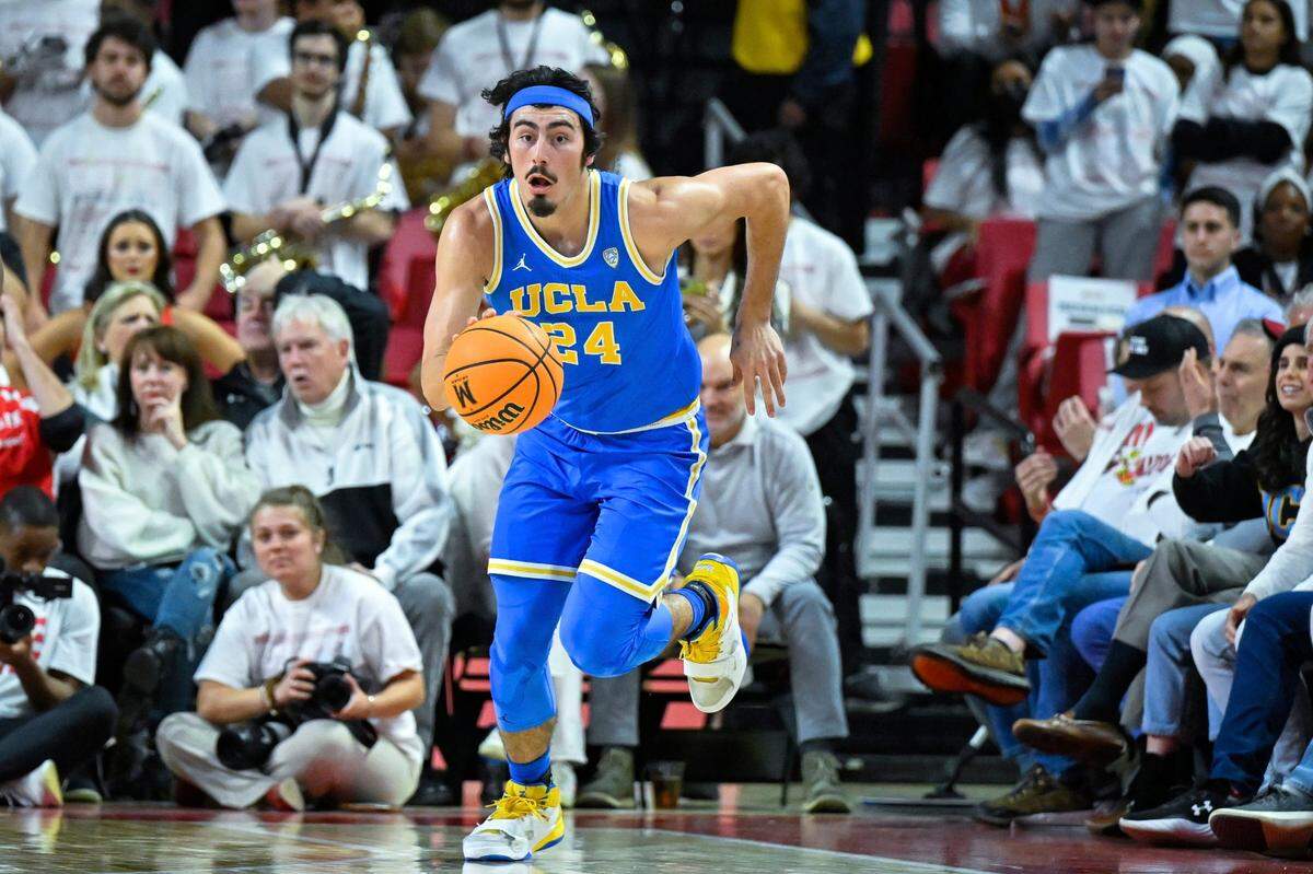 UCLA guard Jaime Jaquez Jr. (24) brings the ball up court during the first half of an NCAA college basketball game against Maryland, Wednesday, Dec. 14, 2022, in College Park, Md. (AP Photo/Terrance Williams)