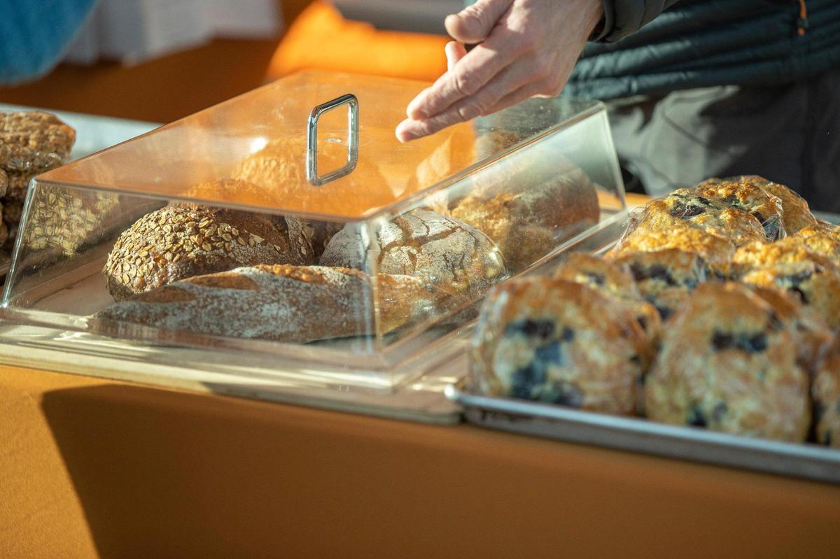 Andy Brown sells his baked goods – including rye bread, made with Kentucky-grown rye – at the Chevy Chase Farmers Market at Apostles Anglican Church in Lexington, Ky., on Wednesday, April 20, 2022.