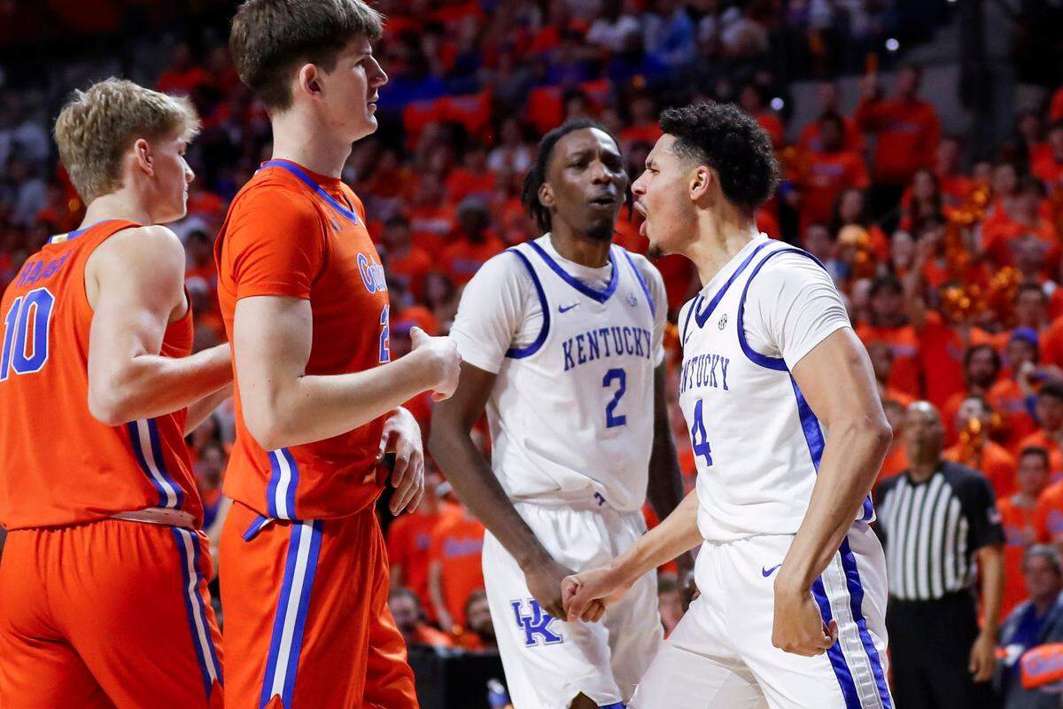 Kentucky forward Tre Mitchell (4) celebrates scoring against Florida during Saturday’s game.