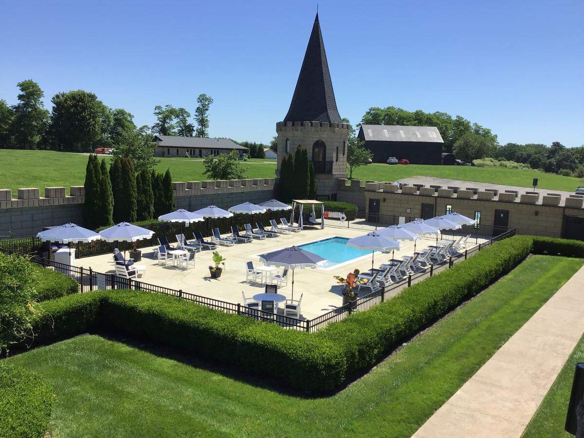 The pool at the Kentucky Castle waited for hotel guests on a cloudless June morning. In summer, the landmark venue has about 80% occupancy, according to owner Wes Henderson, and the wedding venue and the restaurant stay busy, he said.