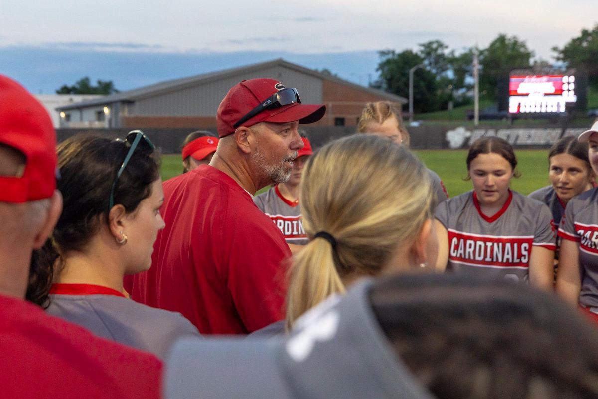 Scott County head coach James Wagoner addresses his team after Thursday’s championship. Wagoner spoke highly of the youth softball development program in Georgetown, which led to the Cardinals and county rival Great Crossing both reaching the 11th Region title game.