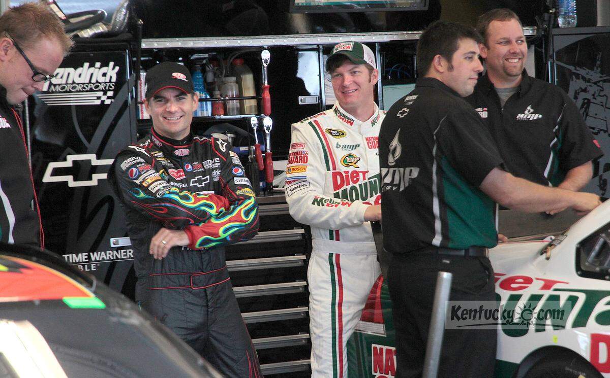 Jeff Gordon, center left, visited Dale Earnhardt Jr. in the Kentucky Speedway garage area before the inaugural Quaker State 400 in 2011. The retirement in recent years of Earnhardt Jr. and Gordon removed the two Cup Series stars with the largest fan followings.